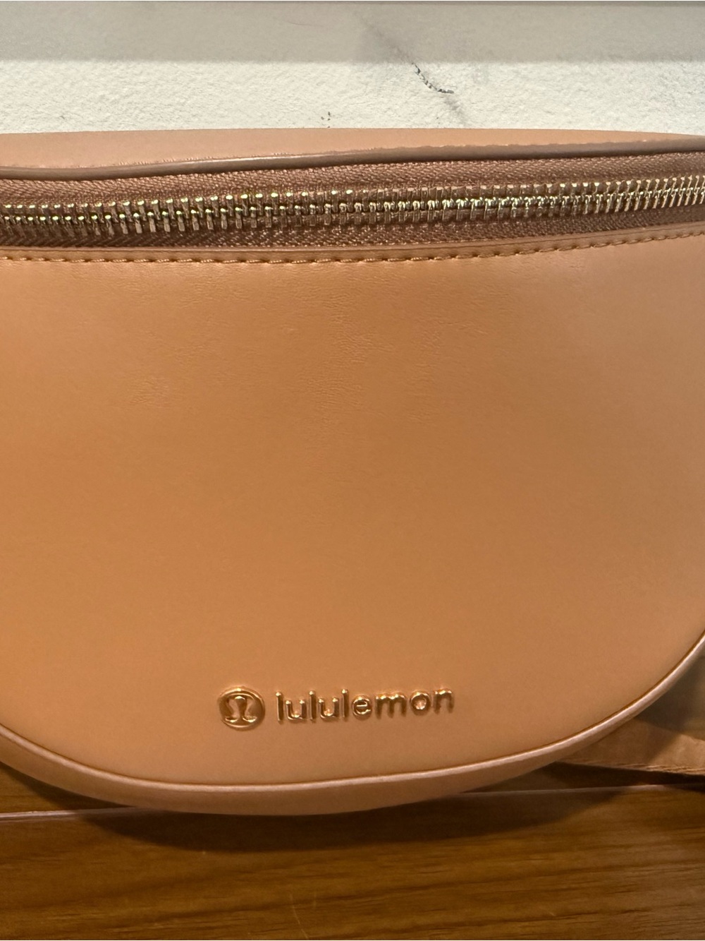 lululemon athletica Peachy Tan Crossbody Bag with Gold Logo